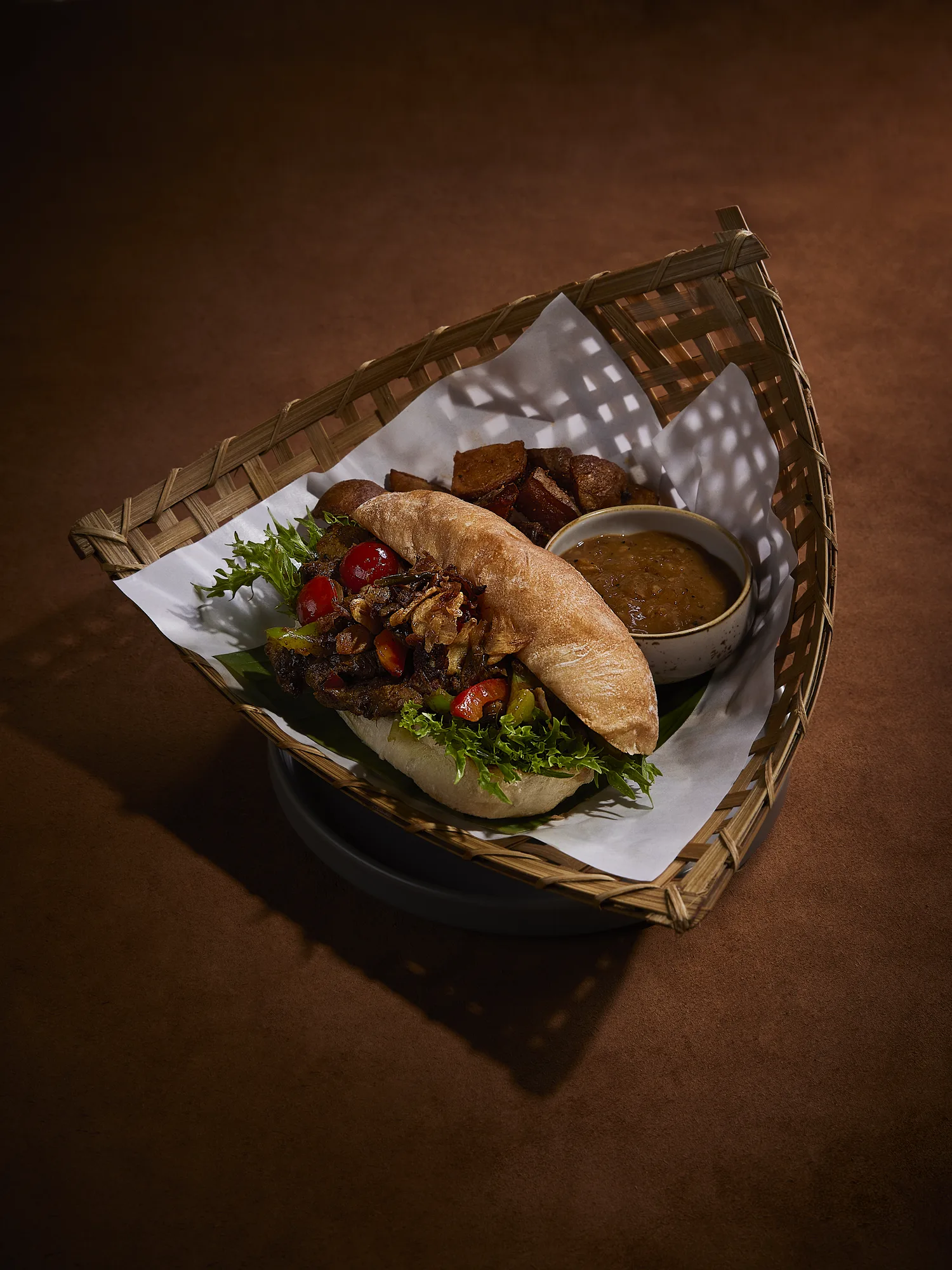 Indonesian dish served in a woven bamboo basket