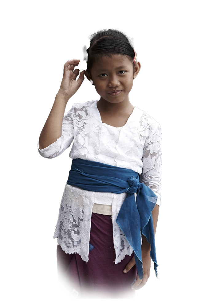 Young Balinese dancer greeting guests with a sembah